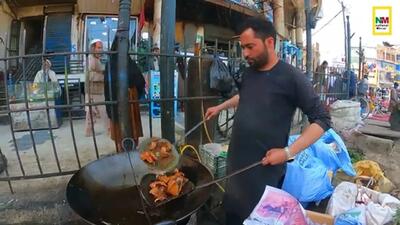 (ویدئو) غذای خیابانی در افغانستان؛ برش، پردازش و پخت صدها ماهی