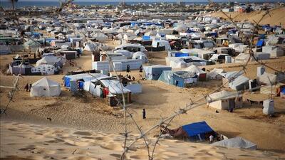 وضعیت ناگوار آوارگان غزه؛ وقتی جز کفن چیزی برای فرار از سرما وجود ندارد