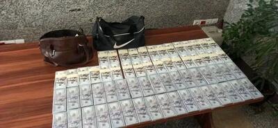 کشف ۶ هزار و ۴۰۰ اسکناس تقلبی دلار؛ دستگیری چهار نفر