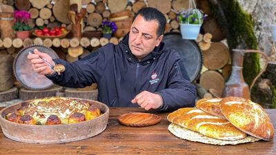 غذای روستایی در آذربایجان؛ پخت دلمه کلم غول پیکر توسط توکل (فیلم)