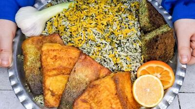 طرز تهیه سبزی پلو با ماهی اصیل ایرانی برای شام شب عید (فیلم)