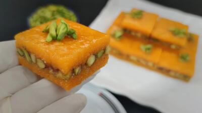 اسلایس نارگیل پسته ترکیبی فوق العاده از باقلوا و لوز با طعمی منحصر به فرد مخصوص عید با تمام نکات ریز