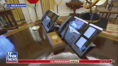 ترامپ دکمه قرمز روی میزش را به خبرنگاران نشان داد و شایعاتی مبنی بر اینکه این میز برای سلاح هسته ای در نظر گرفته شده بود را تکذیب کرد + فیلم