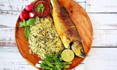 آیا می دانید چرا غذای شب عید «سبزی پلو با ماهی» است؟/ طرز تهیهیک ماهی پلوی بسیار خوشمزه