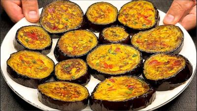 طرز پخت یک غذای جدید ایتالیایی با ۲ بادمجان، یک پیاز و ۲ تخم مرغ (فیلم)