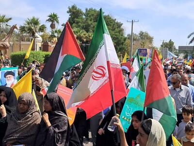 اهتزاز پرچم های ایران، فلسطین، حزب الله لبنان در مراسم راهپیمایی روز قدس