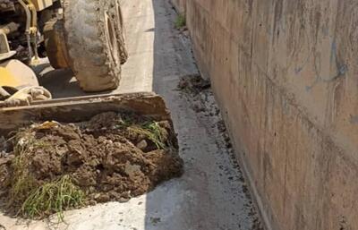 پاکسازی دوربرگردان جاده راه‌بندر اندیمشک پس از یک سال مسدودیت