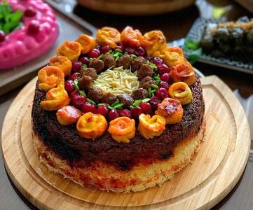 دستور پخت ته‌چین متفاوت آلبالو پلو با کوفته قلقلی