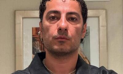 سیگار کشیدن نوید محمدزاده با یک غریبه در آمریکا