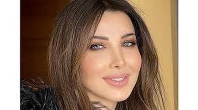 عکس/قاب خانوادگی نانسی عجرم با همسر و سه دخترش