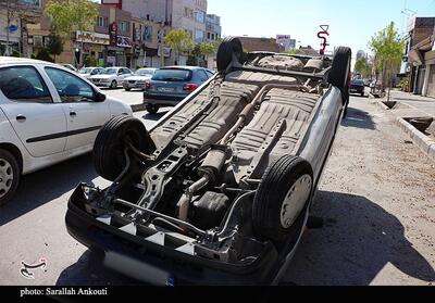 واژگونی غیرمعمول یک دستگاه پراید در خیابان‌های کرمان- عکس صفحه استان تسنیم | Tasnim