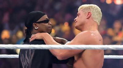 تریپل اچ: تراویس اسکات عاشق WWE است - پارس فوتبال