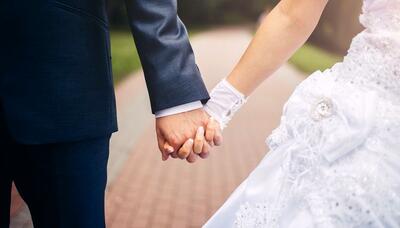 ازدواج جنجالی مرد بلند قد و زن کوتوله +عکس