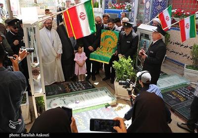 نسیم کرامت در دیار حاج قاسم؛پرچم رضوی برفراز مزار خادم‌الرضا - تسنیم