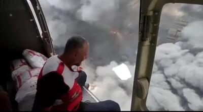 فیلم لحظه دلهره‌آور انفجار زیر بالگرد امداد، حین عملیات اطفاء حریق در بندر شهید رجایى