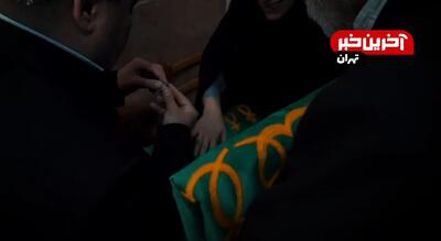 اشک‌های بی امان یک مادر وقتی پرچم امام رضا(ع) بالای سر کودک بیمارش می‌رسد