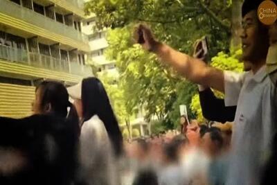 کارگران چینی به موج بیکاری اعتراض کردند