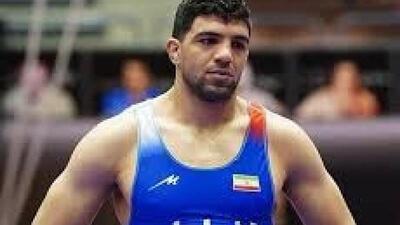 مدال برنز رقابت‌های بین المللی جام تختی برگردن کشتی‌گیر کرمانشاه