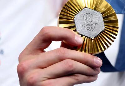 اهدای مدال نایب قهرمان جهان به امام رضا(ع)