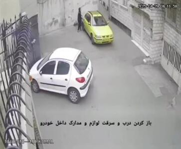 سرقت از تاکسی پارک شده در محله قلمستان تهران + فیلم