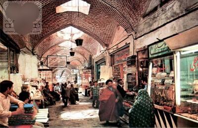 عکس/ نمای جالب از بازار سنتی تبریز در دوره پهلوی با حجره‌های شلوغ | اقتصاد24
