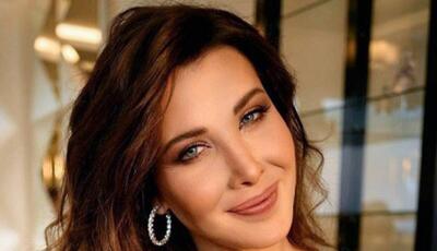 تصویر عاشقانه نانسی عجرم و همسرش در دبی