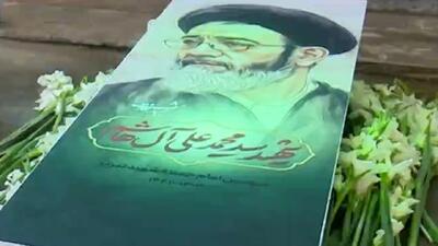 نمایی از ادای احترام عارف به امام جمعه شهید و شهدای تبریز
