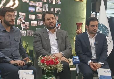 رونمایی از کتاب   ایران‌راه   و   مسکن مردم   در غرفه شهید رئیسی - تسنیم