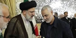 تصاویر اهدای حکم خادمی سردار سلیمانی توسط شهید رئیسی