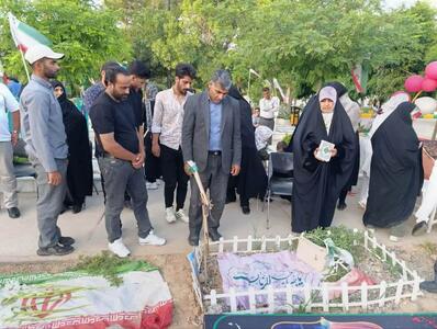 برگزاری مراسم تولد شهید مرزبانی در بهشت رضای مشهد