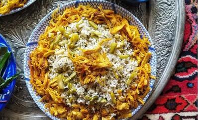 طرز تهیه باقالی پلو با مرغ ریش‌ ریش؛ غذایی خوش‌عطر برای مهمانی‌ها
