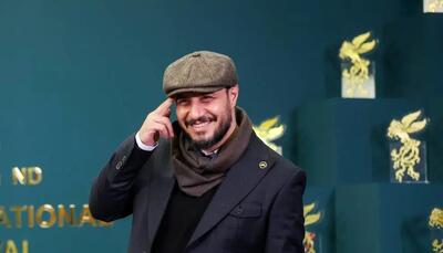 جواد عزتی و عباس جمشیدی‌فر  20 سال پیش کنارهم/ عکس