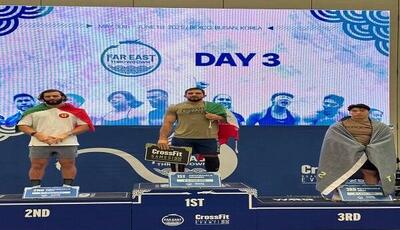 قهرمان کراسفیت ایران بر بام آسیا ایستاد