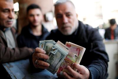 وال استریت ژورنال: شبه‌نظامیان عراقی برای تأمین دلار برای خود و ایران به «ویزا» و «مسترکارت» روی آورده‌اند