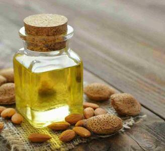 فواید شگفت‌انگیز روغن بادام تلخ برای مو؛ راز موهای سالم - سبک ایده آل