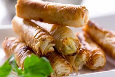 طرز تهیه بورک سیر وحشی با پنیر؛ خوشمزه، ترد و سریع+ویدیو - سبک ایده آل