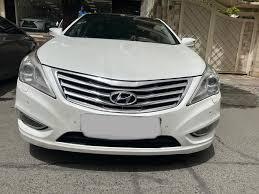 مزایده خرید خودروی هیوندای گرنجور  رنگ : سفید  مدل : 2012 / کف قیمت بازار