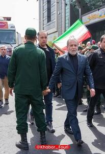 تصویر جالب از رویارویی عراقچی و یک نظامی در مراسم تشییع شهدا | رویداد24