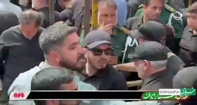 حضور سردار قاآنی فرمانده سپاه قدس به همراه همسرش در مراسم تشییع پیکر شهیدان باقری و حاجی‌زاده