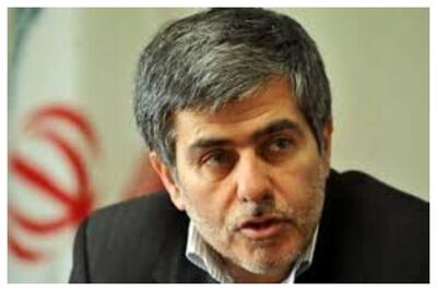 قابی از شهید هسته ای ایران در کنار رهبر انقلاب+ عکسی