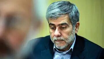 تصویری از شهید فریدون عباسی در کنار رهبر انقلاب