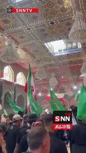 برافراشته شدن پرچم جمهوری اسلامی ایران در حرم امام حسین (ع)