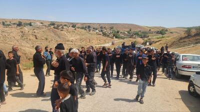 دسته‌ عزاداری ظهر عاشورا در روستای فخرالدین