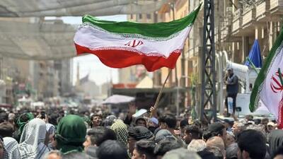 اهتزاز پرچم ایران در دسته طویریج کربلا