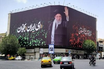 عکس/ رونمایی از دیوارنگاره‌ ای ایران بخوان میدان انقلاب | اقتصاد24