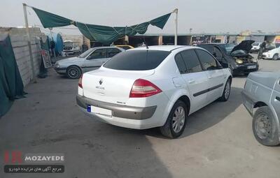 مزایده ( بیمه تجارت) فروش خودرو رنو مگان اتومات 2000 سفید مدل 1390 / قیمت :  420/000/000 تومان
