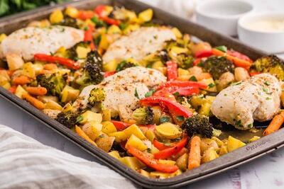 طرز تهیه مرغ تنوری لذیذ با سیر و کره